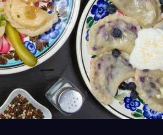 Blueberry pierogi with cream